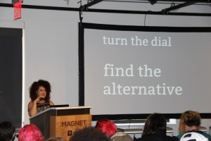 Photo of Leigh Alexander under her slide "turn the dial / find the alternative"