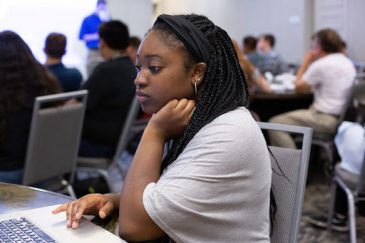 Victoria Hodge working on a project during her summer internship at Student Reporting Labs.